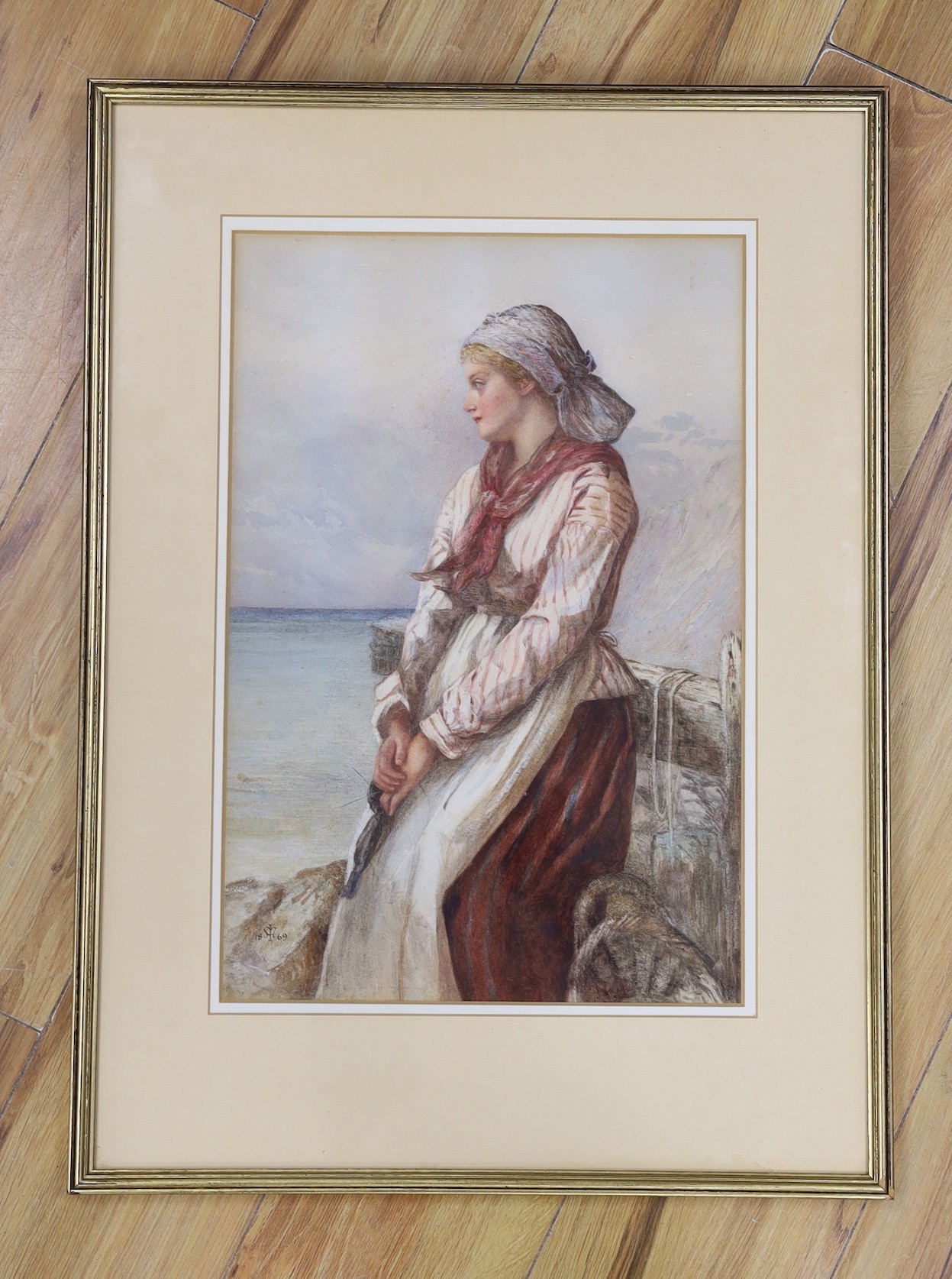 Victorian School, watercolour, woman beside the seashore, monogrammed and dated 1869, 45 x 30cm